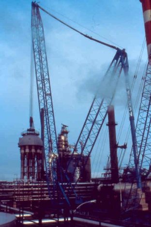 Lift out over pipe rack=